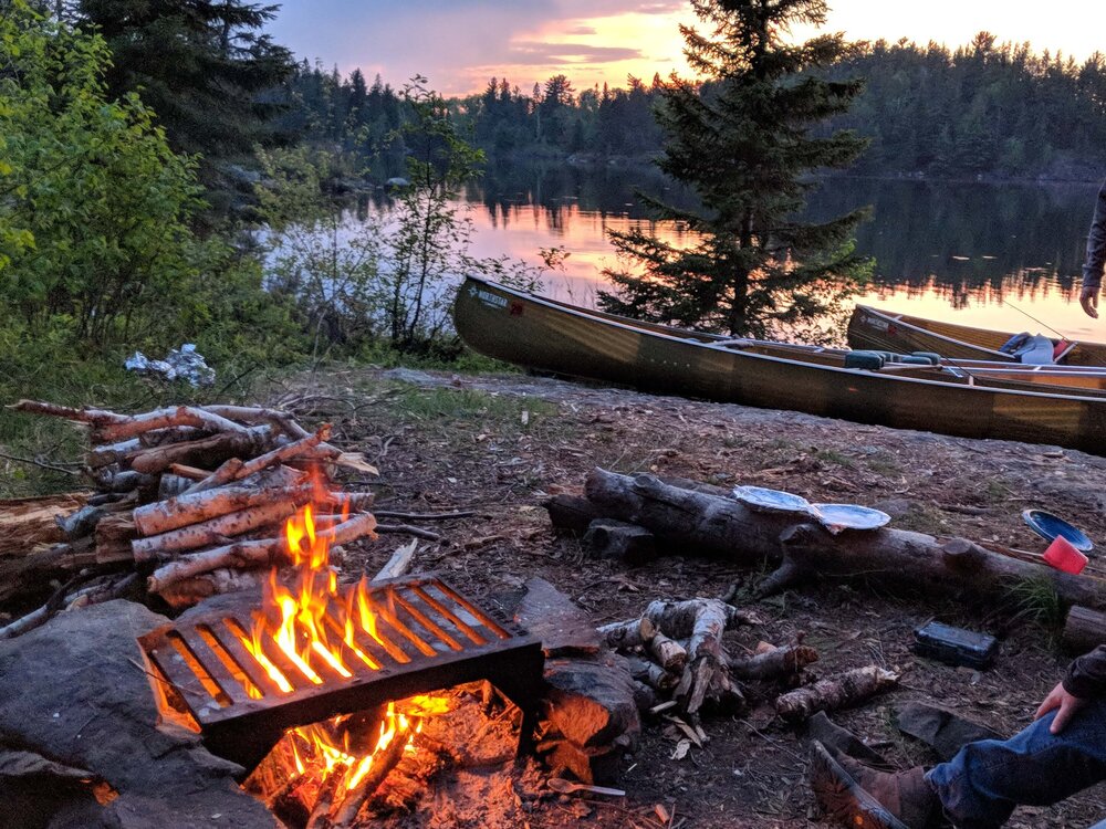 Fire in a grate by the lake