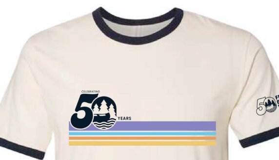 Write Tshirt with a 50-Friends logo on the front