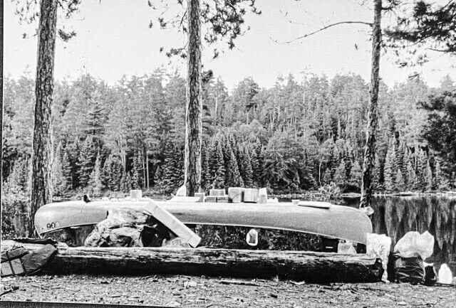 Black and white photo of canoe as a table in the BWCA