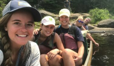 Cecilia Meyerson and bachelorettes in a canoe in the BWCA