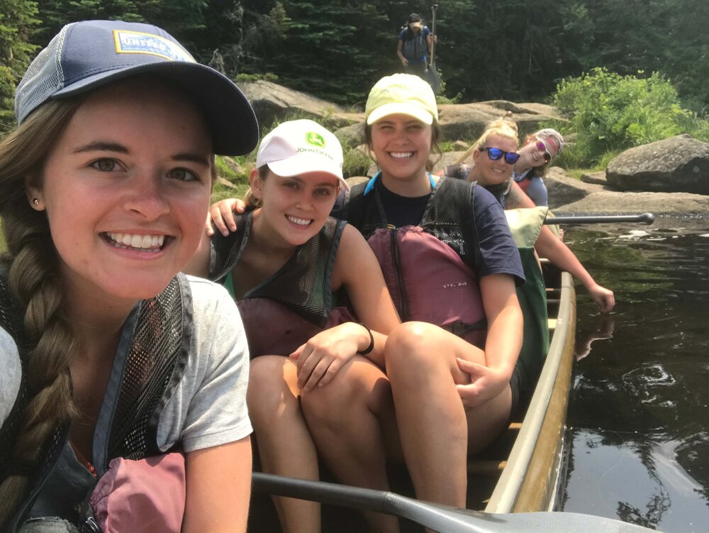 Cecilia Meyerson and bachelorettes in a canoe in the BWCA