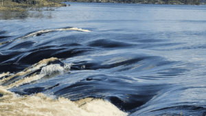 Photo: Barry Knapp Water flows over rocks at the top of Curtain Falls
