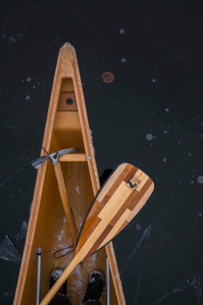 Photo: Ashley Bredemas Canoe and paddle on icy water