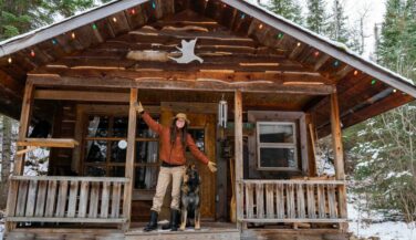 Photo: Ashley Bredemus Ashley Bredemus on the porch of her cabin.