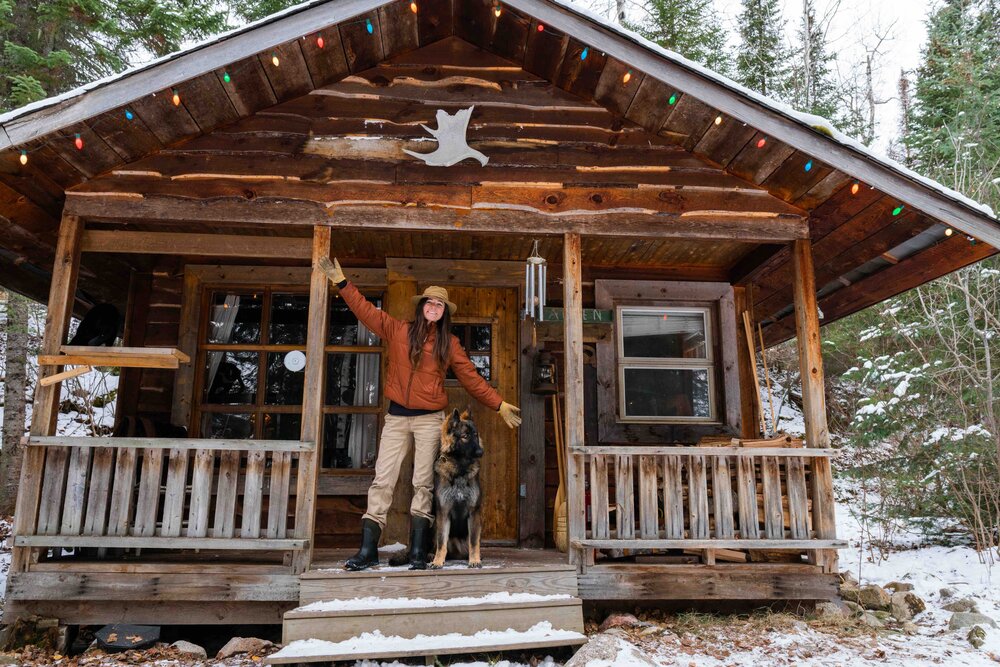 Photo: Ashley Bredemus Ashley Bredemus on the front porch of her cabin