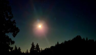 The moon over a lake in the Boundary Waters