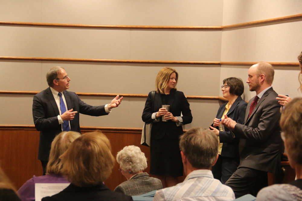Executive Director Chris Knopf and lawyers for MCEA debrief after the hearing