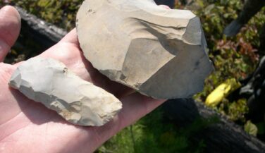 Knife Lake Silt stone tools held in hand