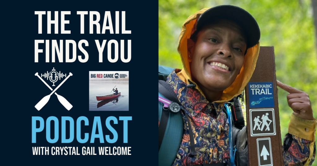 The Trail Finds You Podcast with Crystal Gail Welcome. A smiling hiker points to a sign for the Kekekabic Trail,