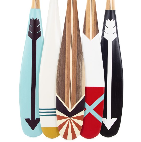 Colorful painted canoe paddles