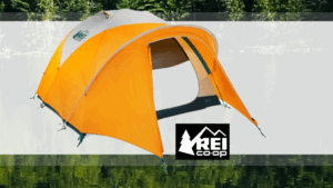 REI Basecamp 4 Tent on a woodsy background