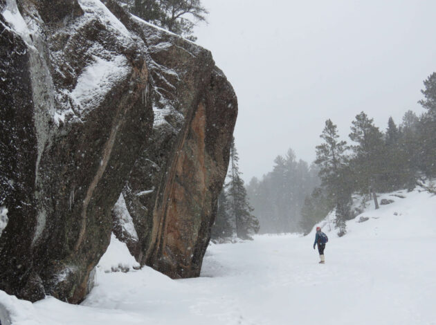Image of a man hiking in the snow in the Boundary Waters