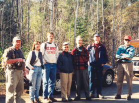 Image of a group of people standing at the Boundary Waters