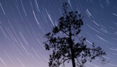 Photo: Bryan Hansel Lamplit tent in the BWCA at night