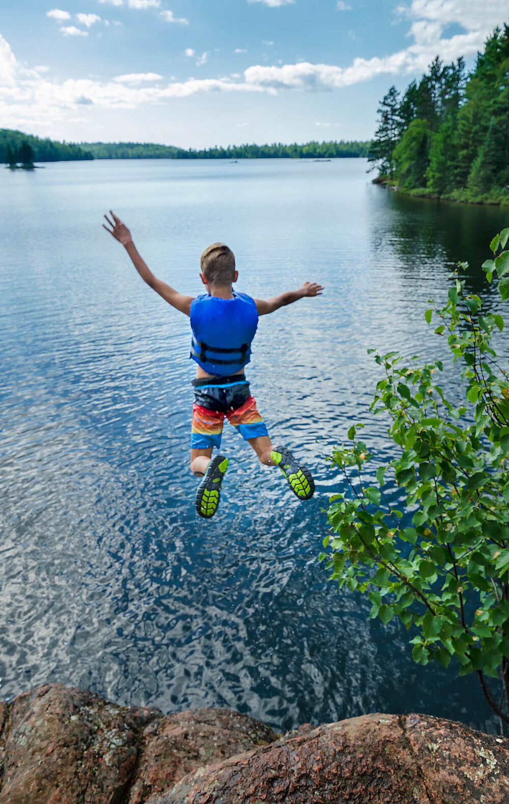 Photo: Mark Tade Kid cliff jumping