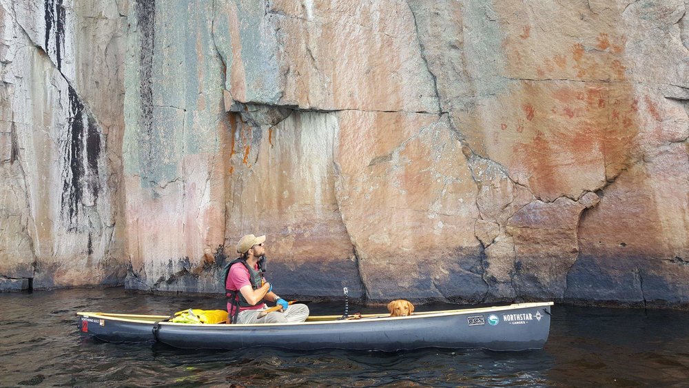 Steve Schraeder paddles under the pictographs on Lac La Croix