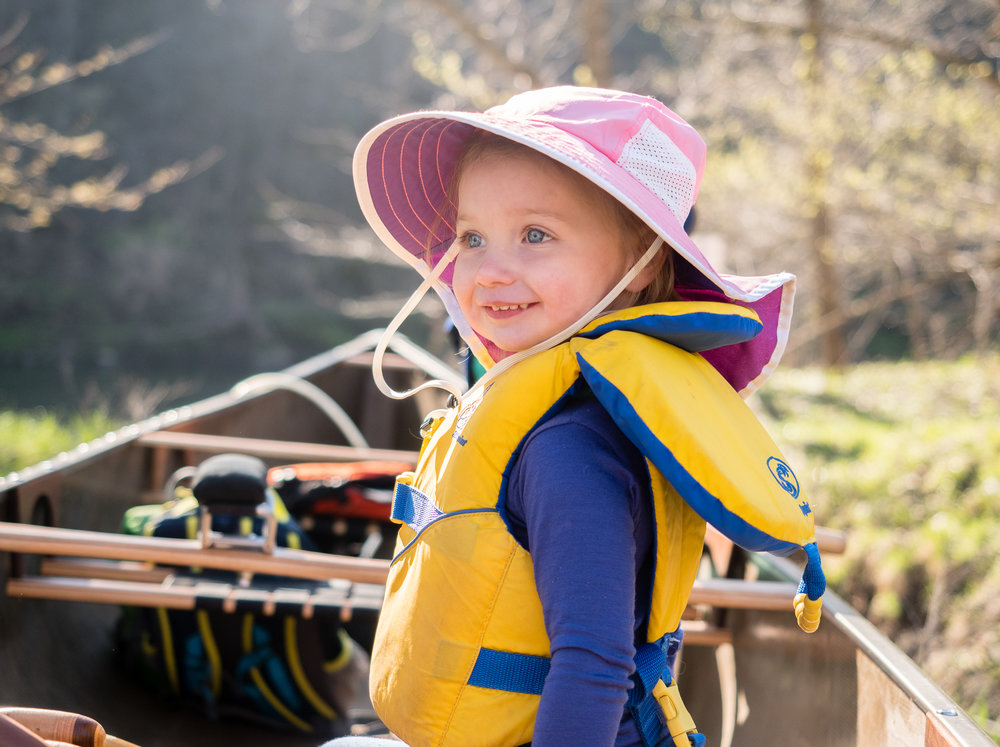 Smiling child in a canoe in the BWCA